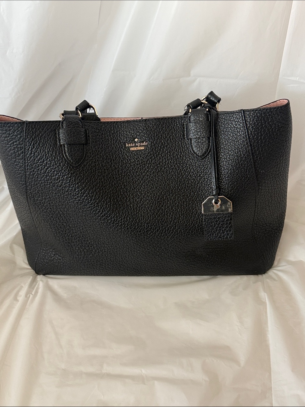 Kate Spade Tyler Carter large blackleather tote ,pink interior, tiny flaw